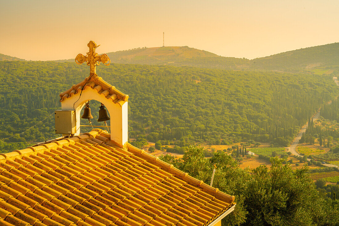 View of church, woodland and vineyards near Poulata, Kefalonia, Ionian Islands, Greek Islands, Greece, Europe\n