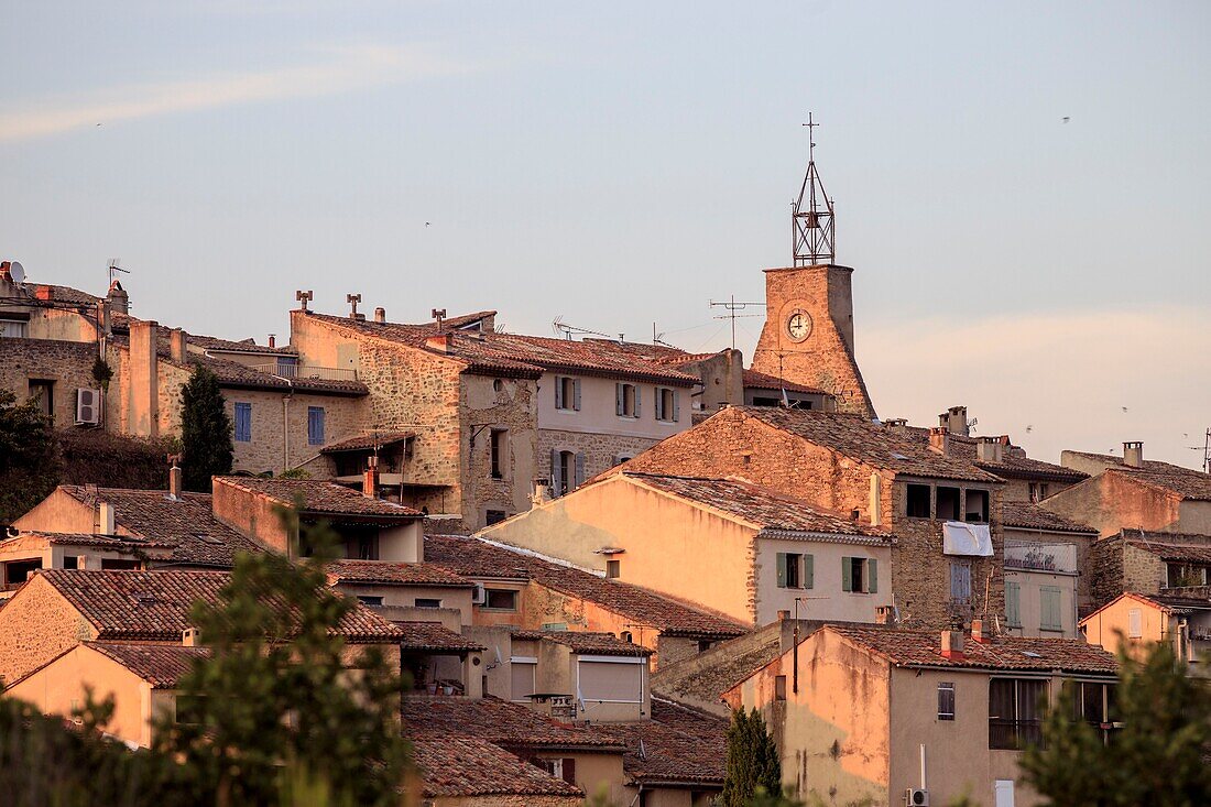 France, Vaucluse, regional natural reserve of Luberon, Ansouis, certified the Most beautiful Villages of France, in the background the Belfry crowned with a wrought iron campanile\n