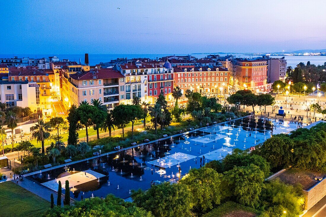 France, Alpes Maritimes, Nice, listed as World Heritage by UNESCO, Promenade du Paillon, Place Massena, the mirror of water, the Mediterranean sea in the background\n