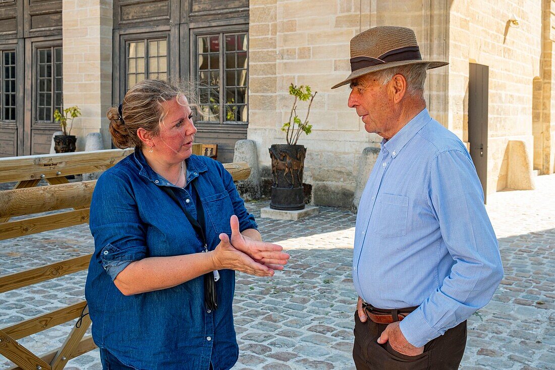 France, Oise, Chantilly, Chantilly Castle, the Great Stables, Géraldine Vandevenne in discussion with the former director of the Great Stables\n