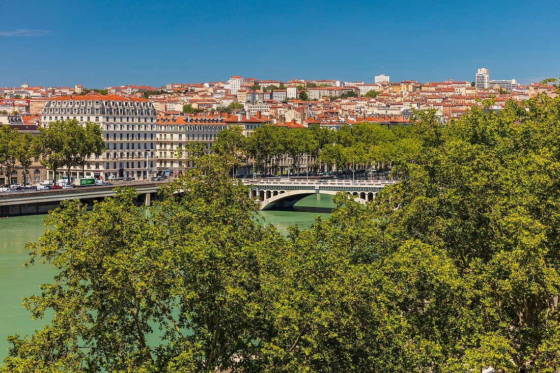 France, Rhone, Lyon, historical site listed as World Heritage by UNESCO, Rhone River banks with a view of the Croix-Rousse District and Wilson bridge\n