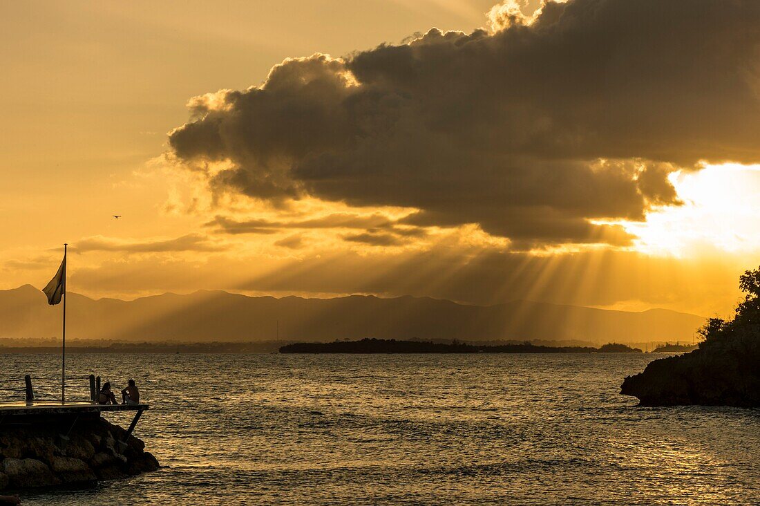 France, Caribbean, Lesser Antilles, Guadeloupe, Grande-Terre, Le Gosier, Creole Beach Hotel, view of the Petit Cul-de-Sac lagoon at sunset\n