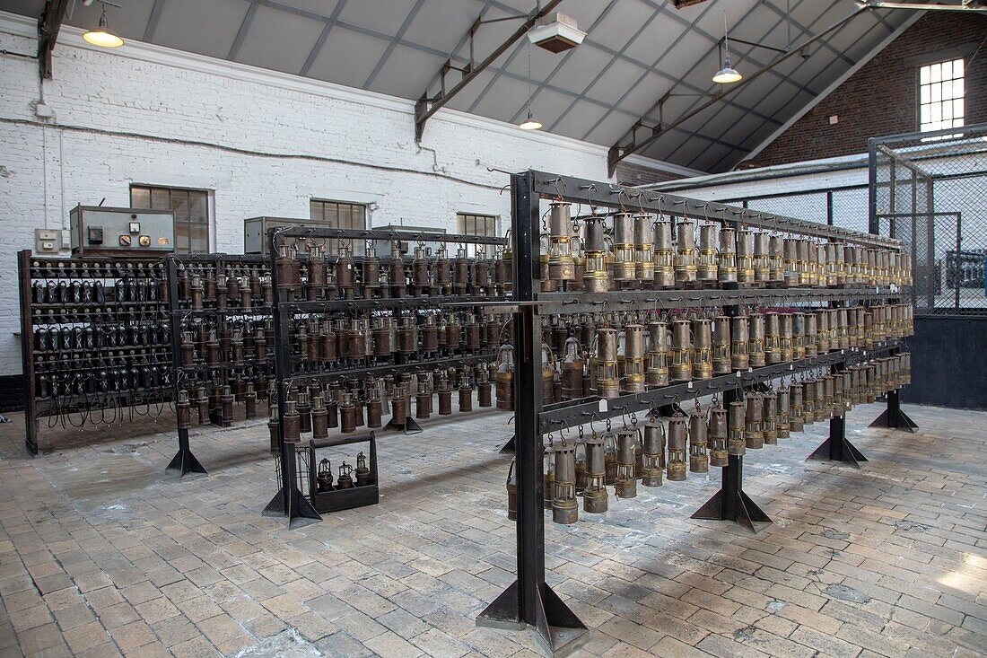 France, Nord, Lewarde, Historic Mining Center listed as World Heritage by UNESCO, visit the reconstituted mine, alignments of the lamps of the miners in the lamp shop\n