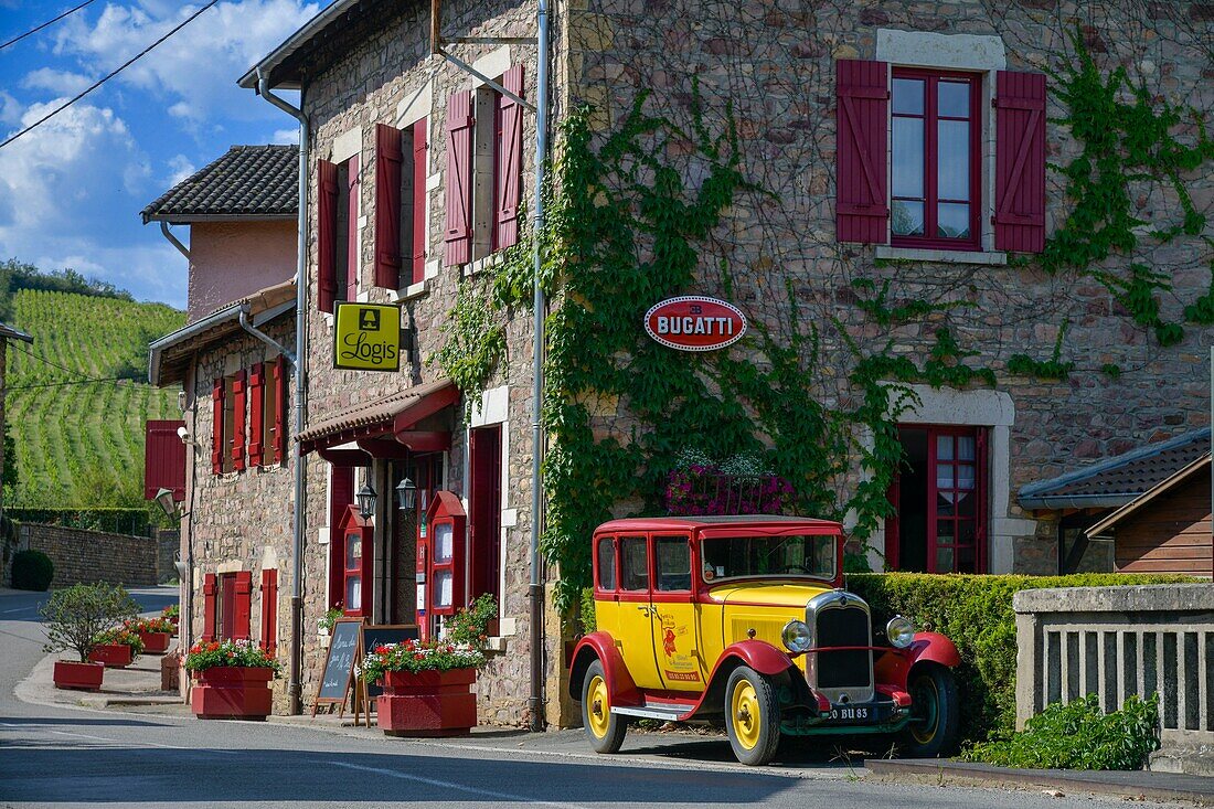 France, Saone et Loire, La Roche, collection car in front of a restaurant on the road\n