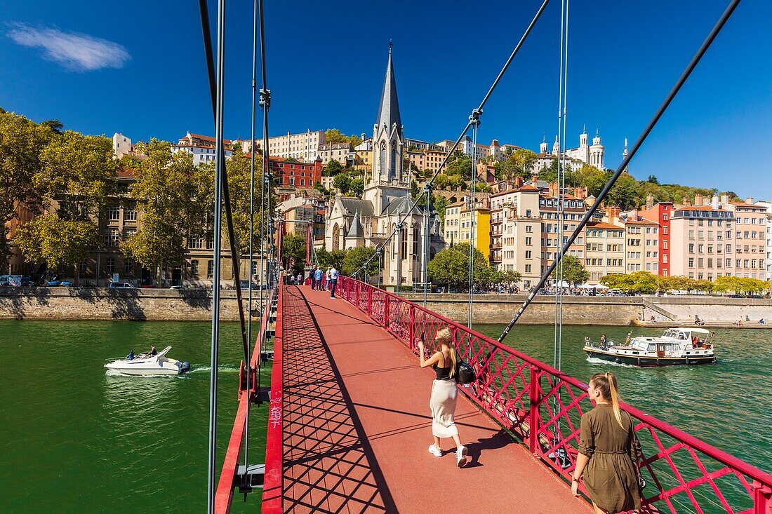 France, Rhone, Lyon, historic centre classified as a UNESCO World Heritage site, Paul Couturier footbridge over the Saone river, Saint-Georges church and Notre-Dame de Fourviere in the background\n