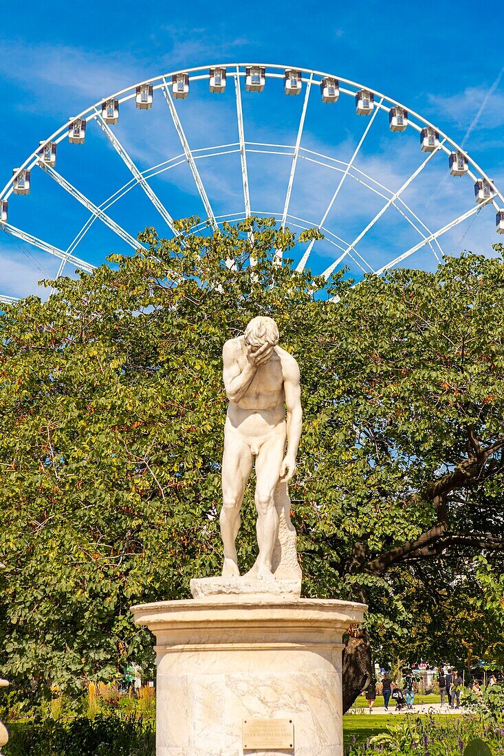 France, Paris, statue of the Tuileries Garden with the Big Wheel\n