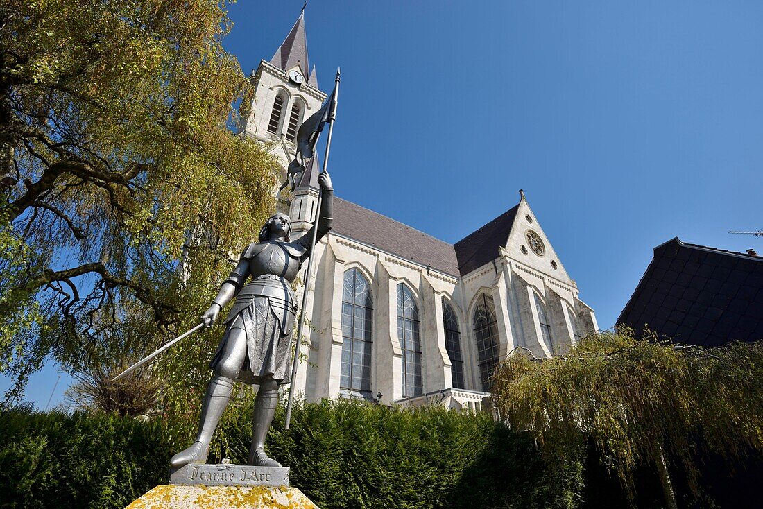France, Nord, Bouvines, Statue of Joan of Arc in front of the Saint Pierre Church of Gothic style of the thirteenth century and built between 1880 and 1885\n