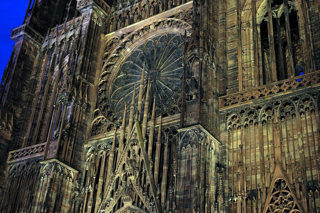 France, Bas Rhin, Strasbourg, old town listed as World Heritage by UNESCO, Notre Dame Cathedral, west facade, evening\n