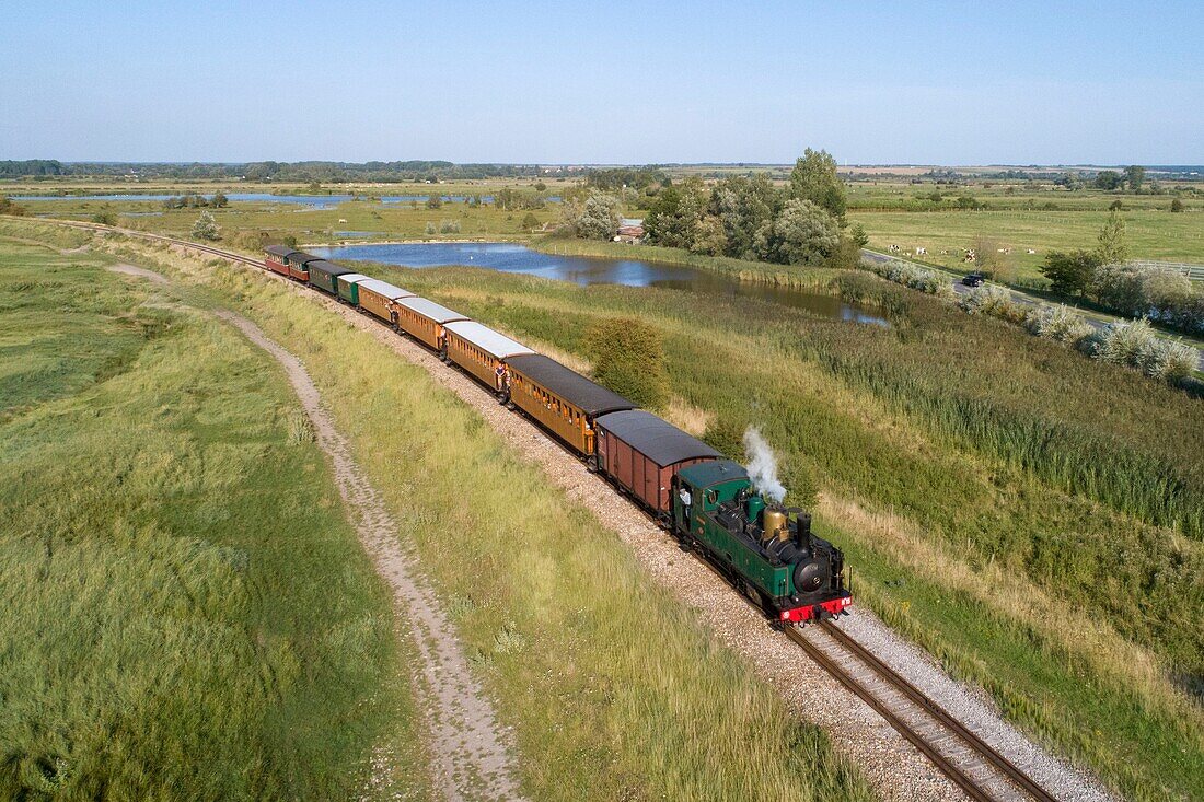 France, Somme, Baie de Somme, Saint Valery sur Somme, railway from the Bay of Somme, tourist train (aerial view)\n