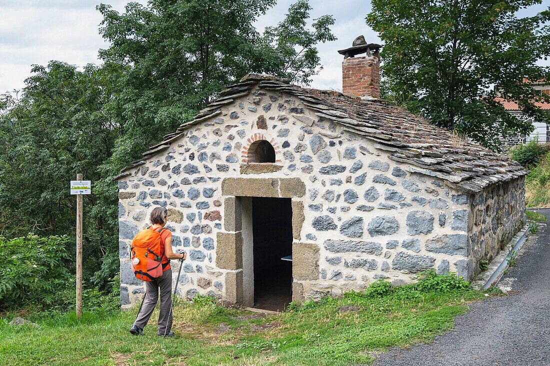France, Haute-Loire, Le Puy-en-Velay, hike on Via Podiensis, one of the French pilgrim routes to Santiago de Compostela or GR 65, old restored oven\n