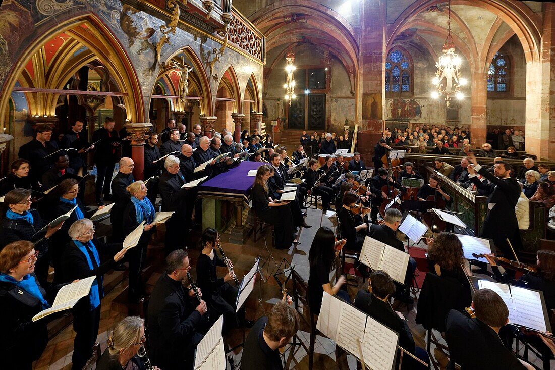 France, Bas Rhin, Strasbourg, old city listed as World Heritage by UNESCO, Saint Pierre le Jeune protestant church, jube of the 14th century surmounted of an organ Silberman (1780), Concert of the Jonas orchestra and the Collegium Cantorum of Strasbourg\n