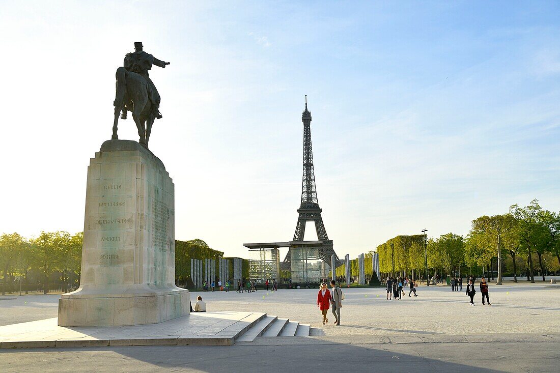 France, Paris, area listed as World Heritage by UNESCO, the Champ de Mars, the statue of Marshal Joffre and the Eiffel Tower\n