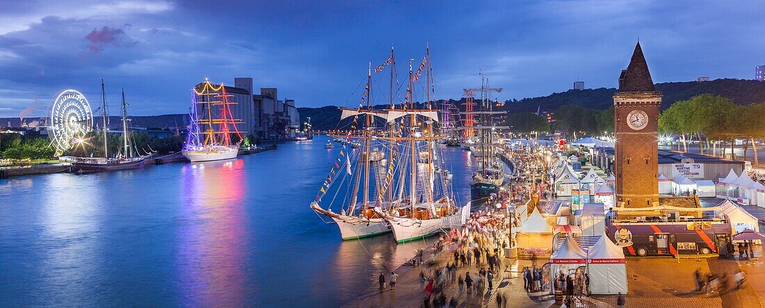 France, Seine Maritime, Rouen, Armada 2019, elevated night view on the crowd of visitors and on moored tall ships\n