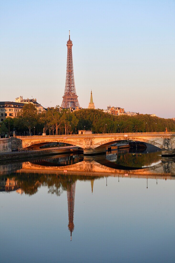 France, Paris, area listed as World Heritage by UNESCO, the banks of the Seine river and the Eiffel Tower on the background\n