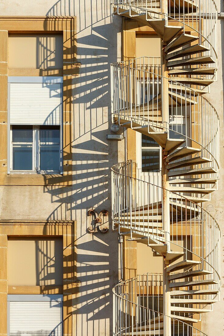 France, Meurthe et Moselle, Nancy, spiral staircase on the facade of Nancy Hospital\n