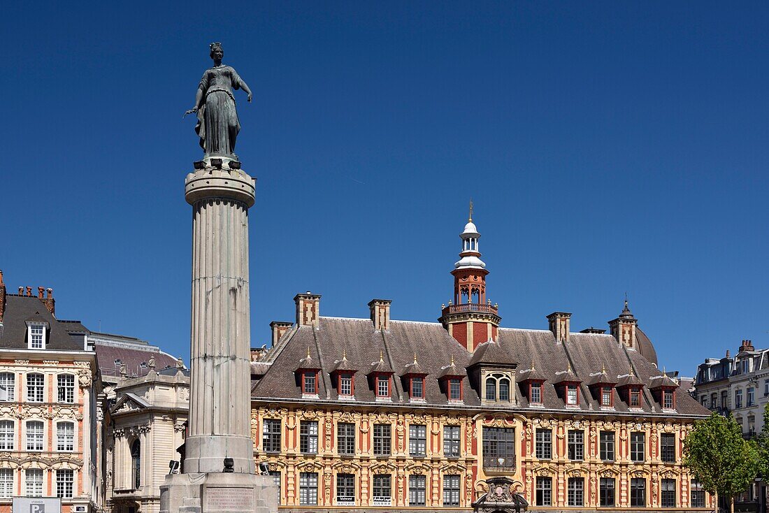 France, Nord, Lille, Place du General De Gaulle or Grand Place, statue of the goddess on its column and the old stock exchange\n
