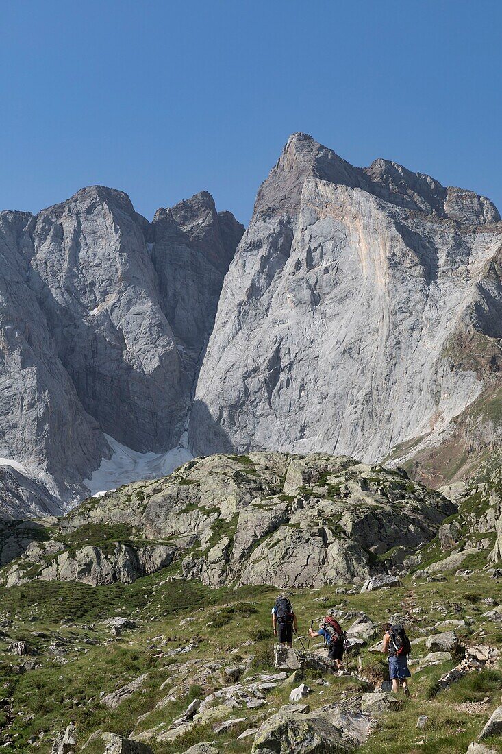 France, Hautes Pyrenees, Cauterets, Gaube valley, hikers on the trail to the Vignemale peak 3298 m\n