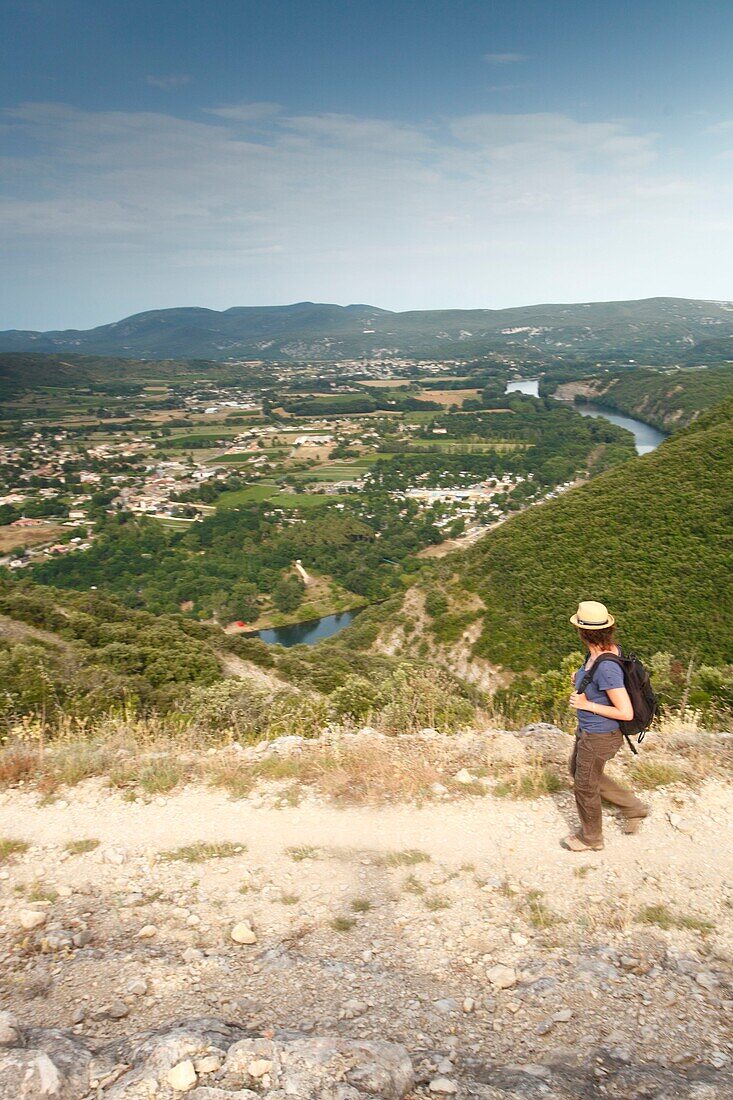 France, Ardeche, Sampzon, Female hiker enjoying the view on the South Ardeche\n