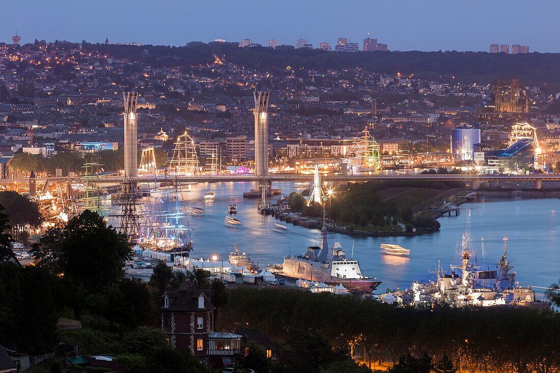 France, Seine Maritime, Canteleu, Armada 2019, elevated night view of boats, docks and Rouen Flaubert Bridge\n