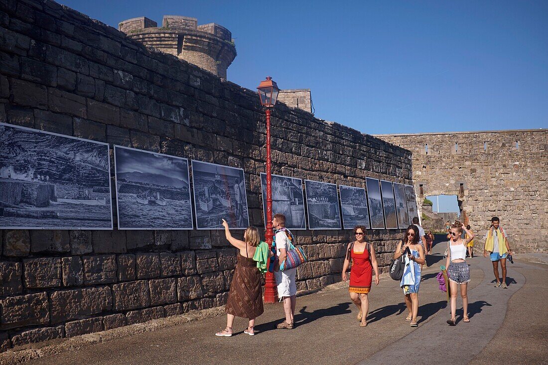 France, Pyrenees Atlantiques, Basque Country coast, Ciboure, Socoa fort, photographic exhibition about the manufacture of concrete blocks that are dropped in front of the dikes to protect them\n