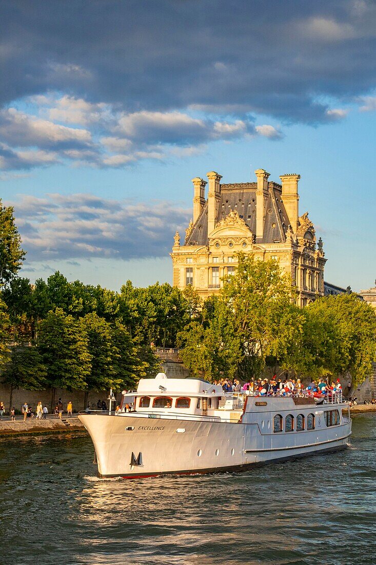 France, Paris, area listed as World Heritage by UNESCO, the Louvre and a boat\n