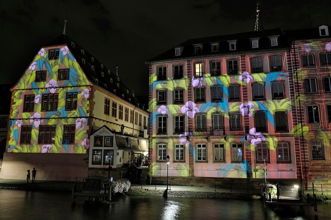 France, Bas Rhin, Strasbourg, old town listed as World Heritage by UNESCO, the Ill river, the Historical museum, video mapping on the facade, summer evening 2019\n
