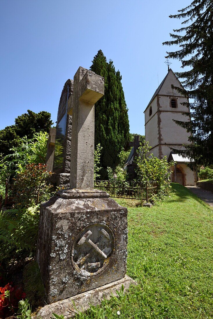 France, Haut Rhin, Sainte Marie aux Mines, Saint Pierre sur-L Hate, church, cemetery next to church, grave, miners emblems, hammer and pointerolle\n