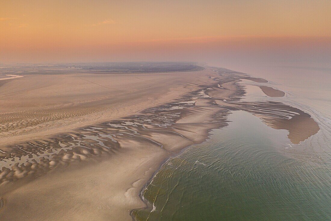 France, Pas-de-Calais, Opal Coast, Authie Bay, Berck-sur-Mer, Authie Bay at low tide unveils the sandbanks at sunrise (aerial view)\n