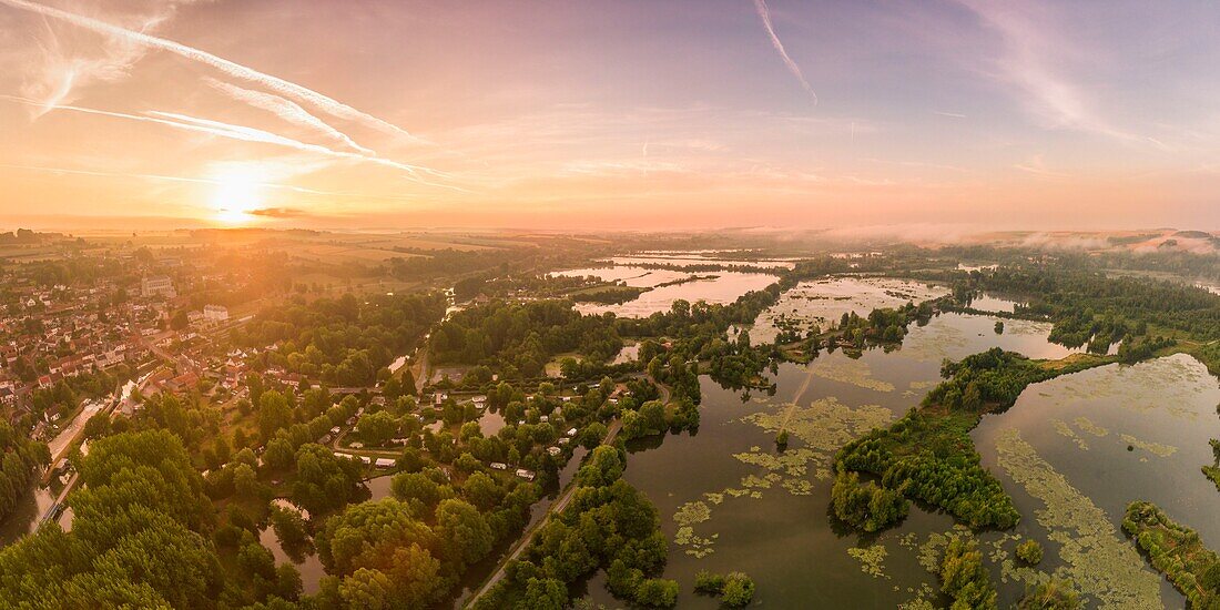 France, Somme, Valley of the Somme, Long, the swamps of the Somme at Long in the early morning, the valley of the Somme still misty (vue aérienne)\n