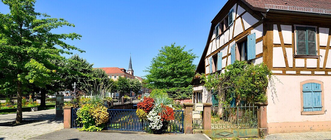 France, Bas Rhin, Niederbronn les Bains, Falkensteinerbach river and St Martin and St John churches\n