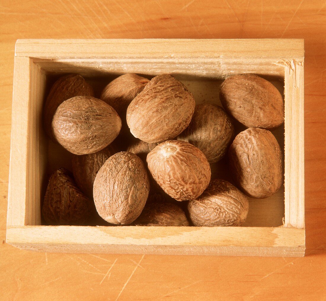 A Wooden Box Full of Walnuts