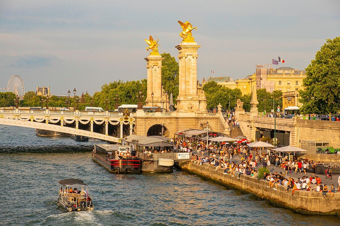 France, Paris, area listed as World Heritage by UNESCO, cruise on a boat in front of Alexandre III bridge\n