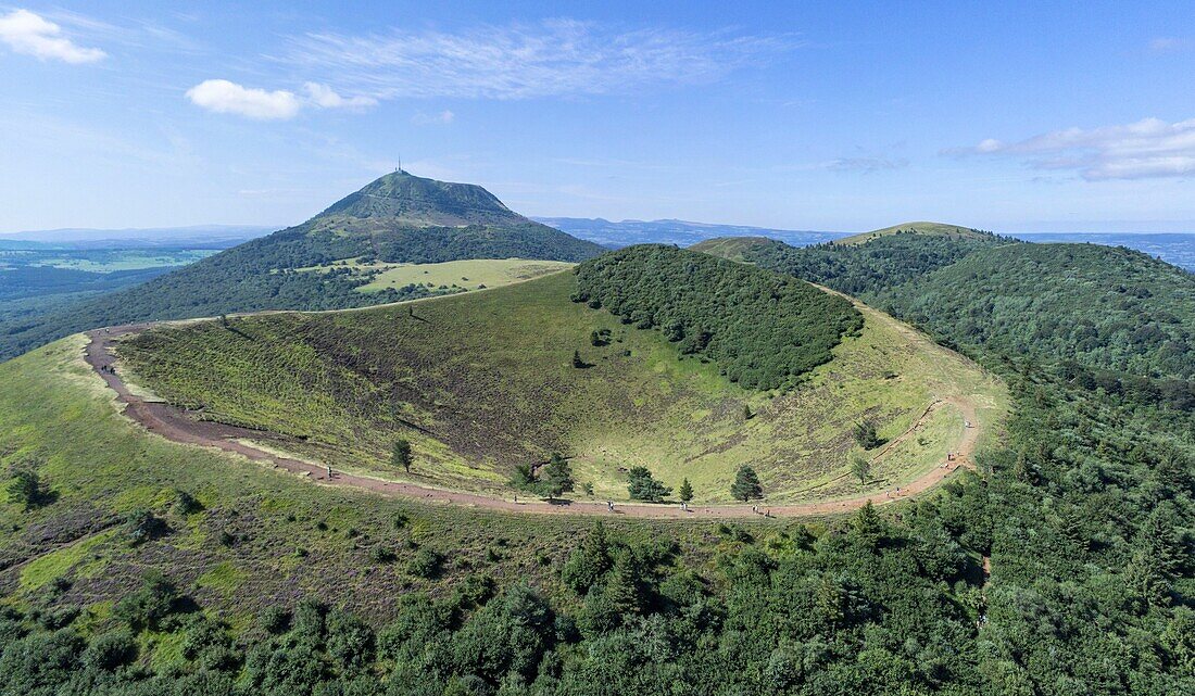 France, Puy de Dome, Orcines, Regional Natural Park of the Auvergne Volcanoes, the Chaîne des Puys, listed as World Heritage by UNESCO, Puy Pariou volcano in the foreground (aerial view)\n