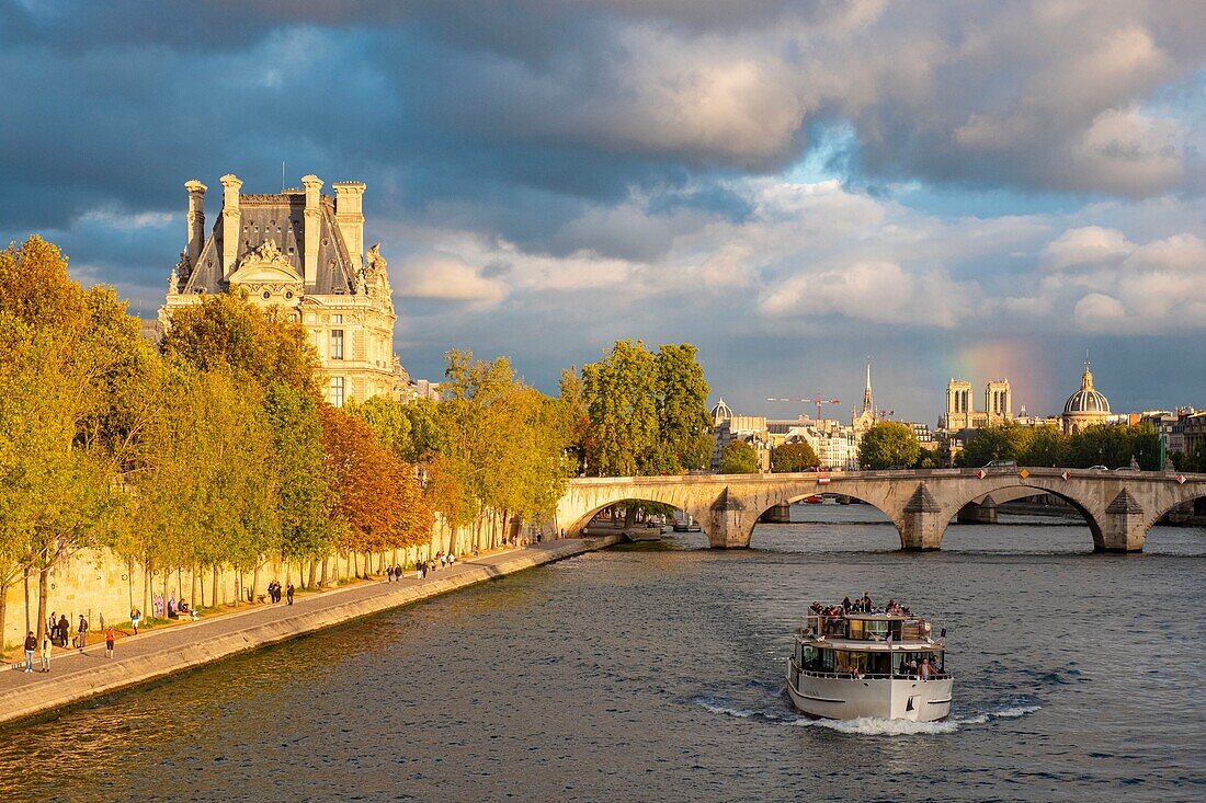France, Paris, area listed as World Heritage by UNESCO, Carrousel Bridge, Rainbow and the Louvre Museum\n