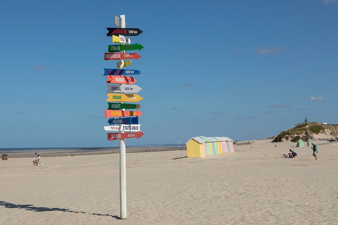 France, Pas de Calais, Berck sur Mer, the beach with beach huts and signs indicating the orientation of different countries\n