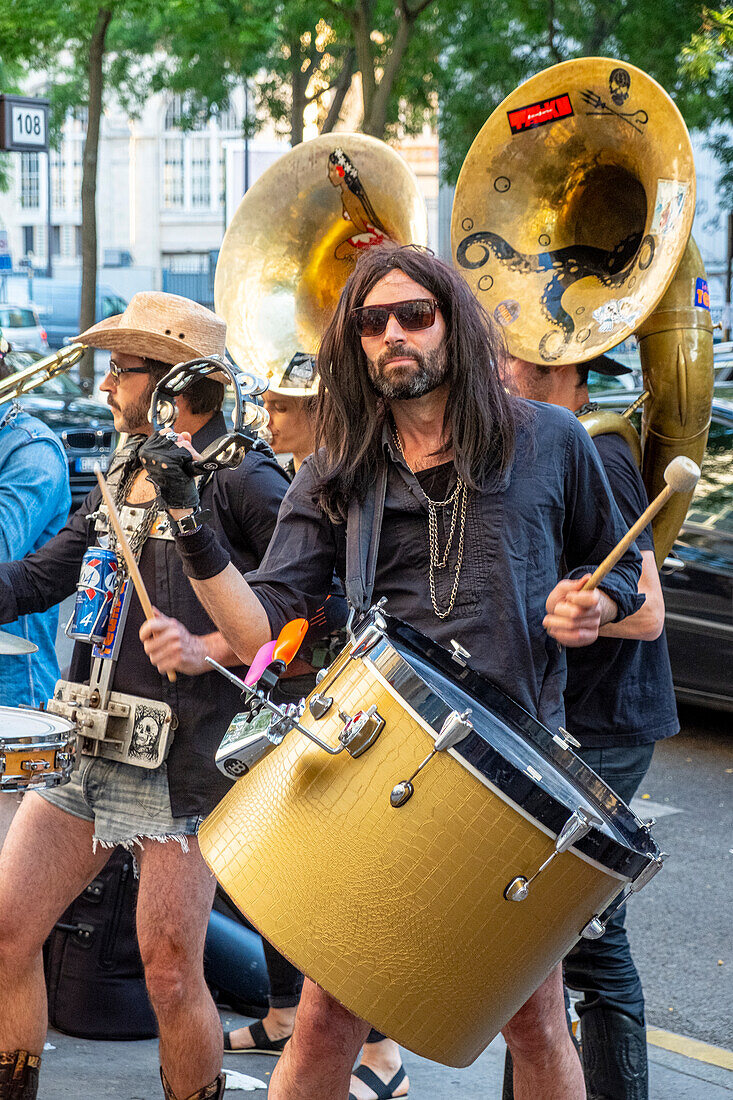 France, Paris, district of Menilmontant, street band during the Fete de la Musique\n