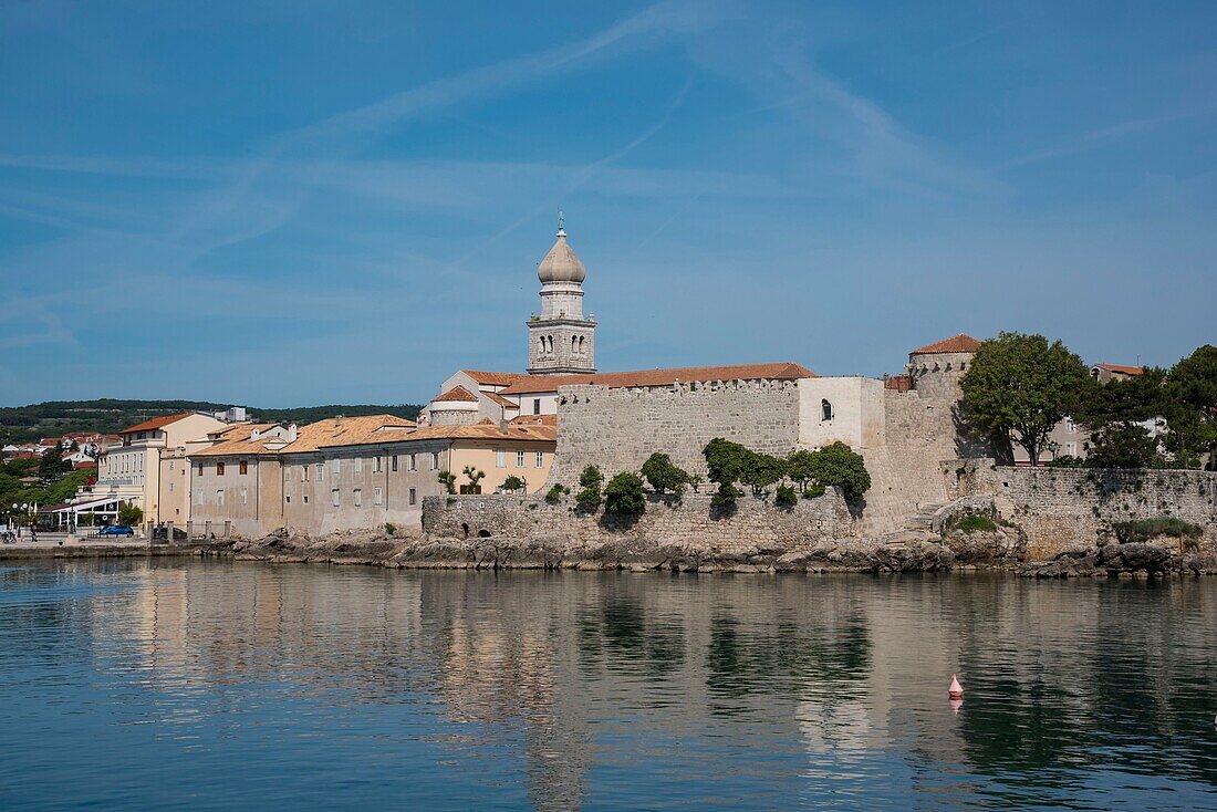 Croatia, County of Primorje-Gorski Kotar, Kvarner bay , Krk island, Krk city, the 1515 bulbous steeple of St Quirin church dominates the ramparts, Frankopan Castle and the Adriatic Sea\n