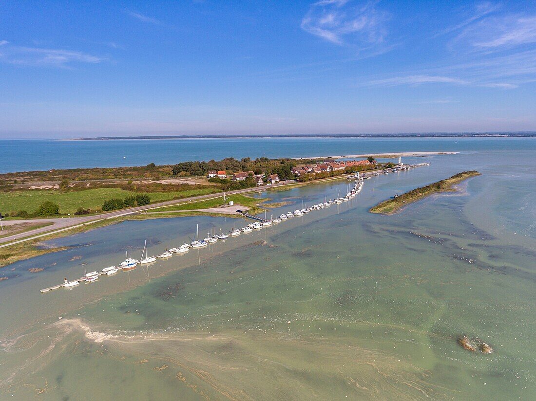 France, Somme, Baie de Somme, Le Hourdel, High tides in the Baie de Somme, The meadows around the Hourdel invaded by water, Le Hourdel and its port (Aerial view)\n