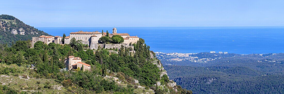 France, Alpes Maritimes, Parc Naturel Regional des Prealpes d'Azur, Gourdon, labeled Les Plus Beaux Villages de France, the coastline of the Côte d'Azur in the background\n