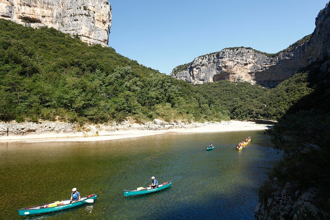 France, Ardeche, Sauze, Ardeche Gorges natural national reserve, tourist on the Ardeche river with kayaks between Gournier bivouac and Sauze\n