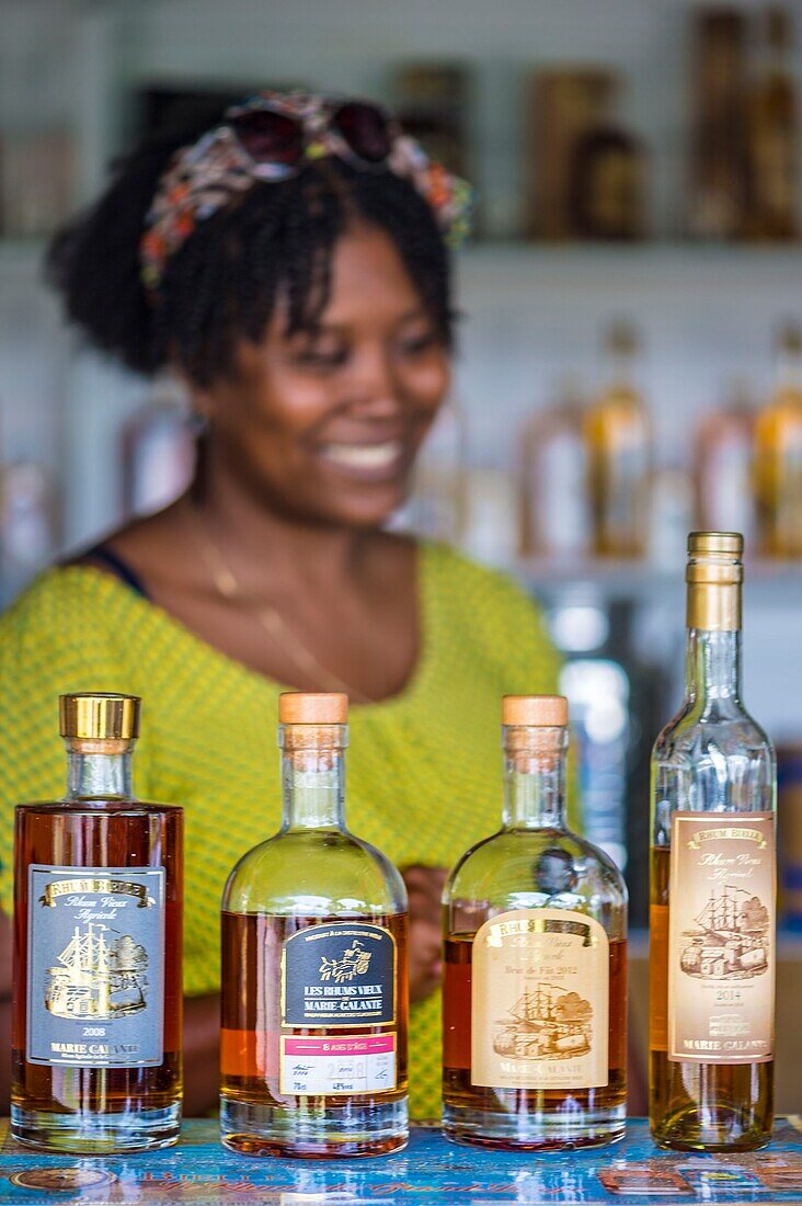 France, Caribbean, Lesser Antilles, Guadeloupe, Marie-Galante, Grand-Bourg, Distillery of agricultural rum Bielle, tasting old and amber rums at the boutique\n