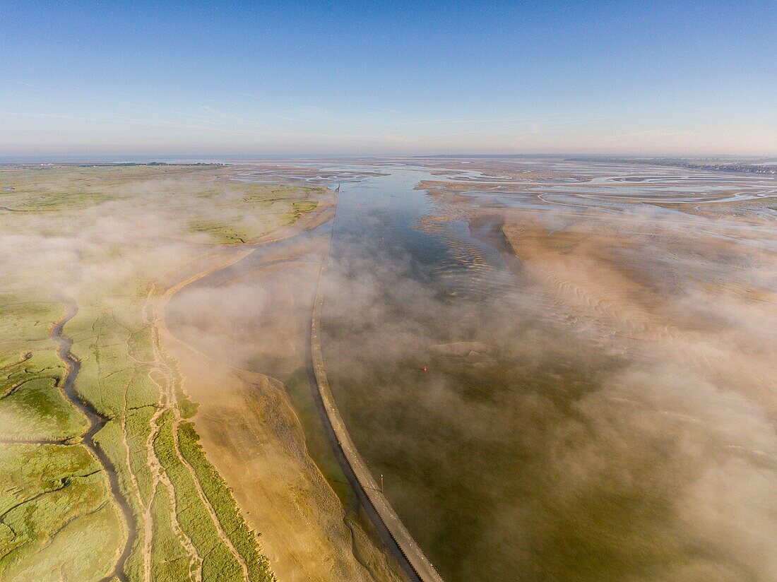 France, Somme, Somme Bay, Saint-Valery-sur-Somme, Cape Hornu and the channel of the Somme in the morning mist (aerial view)\n