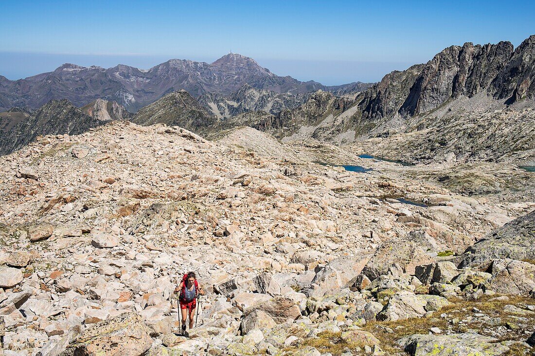 France, Hautes Pyrenees, Pyrenees National Park, ascent of the Pic du Turon de Neouvielle (3035m), Pic du Midi de Bigorre (2875m) in the background\n