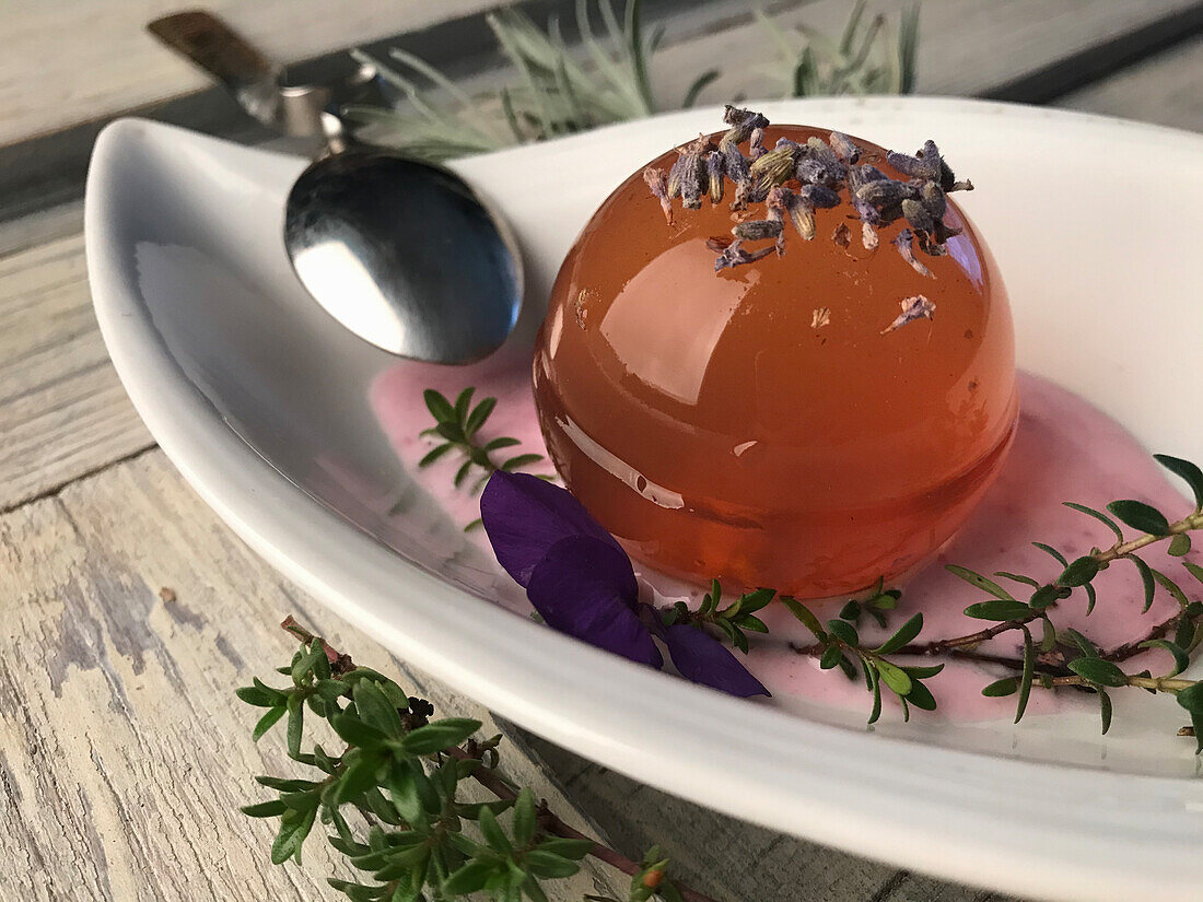 Raindrop dessert: tea jelly with lavender flowers, thyme and lavender syrup