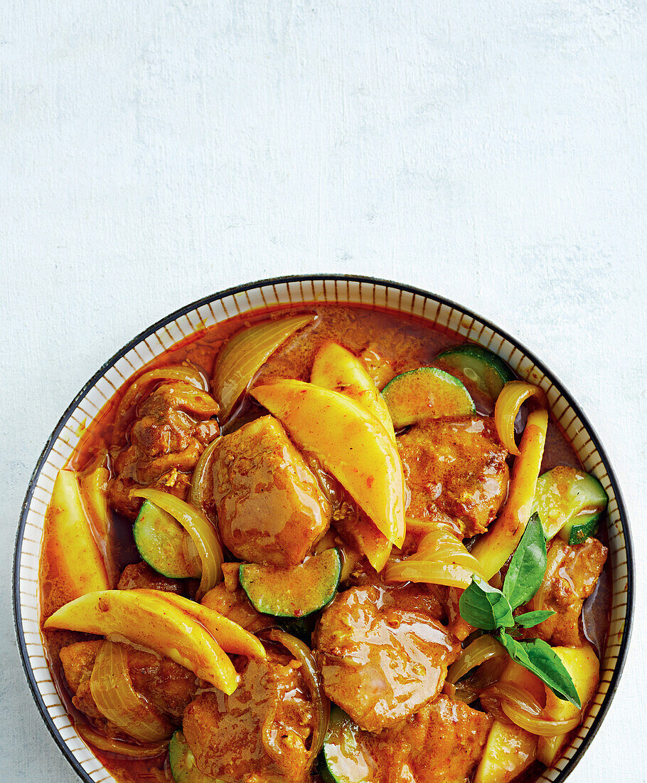 Chicken and mango curry with turmeric