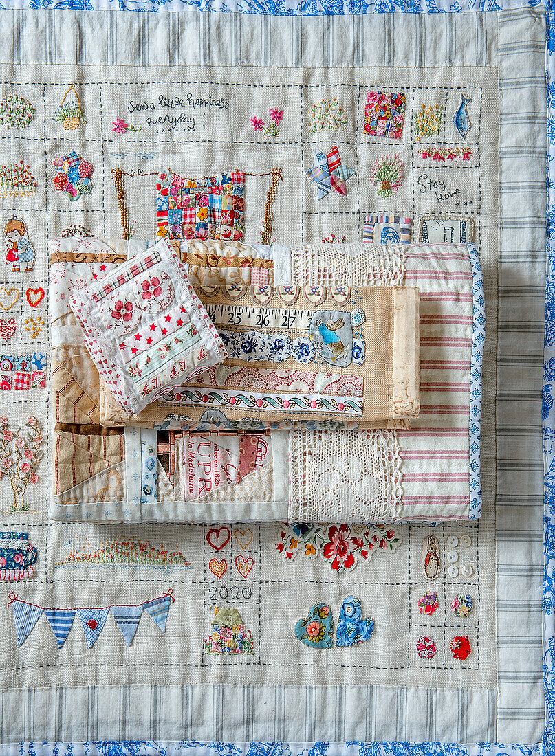 Patchwork blanket with detailed embroidery