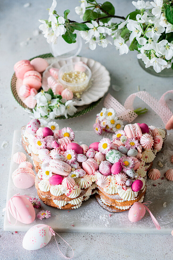 Butterfly-shaped cake with candy eggs