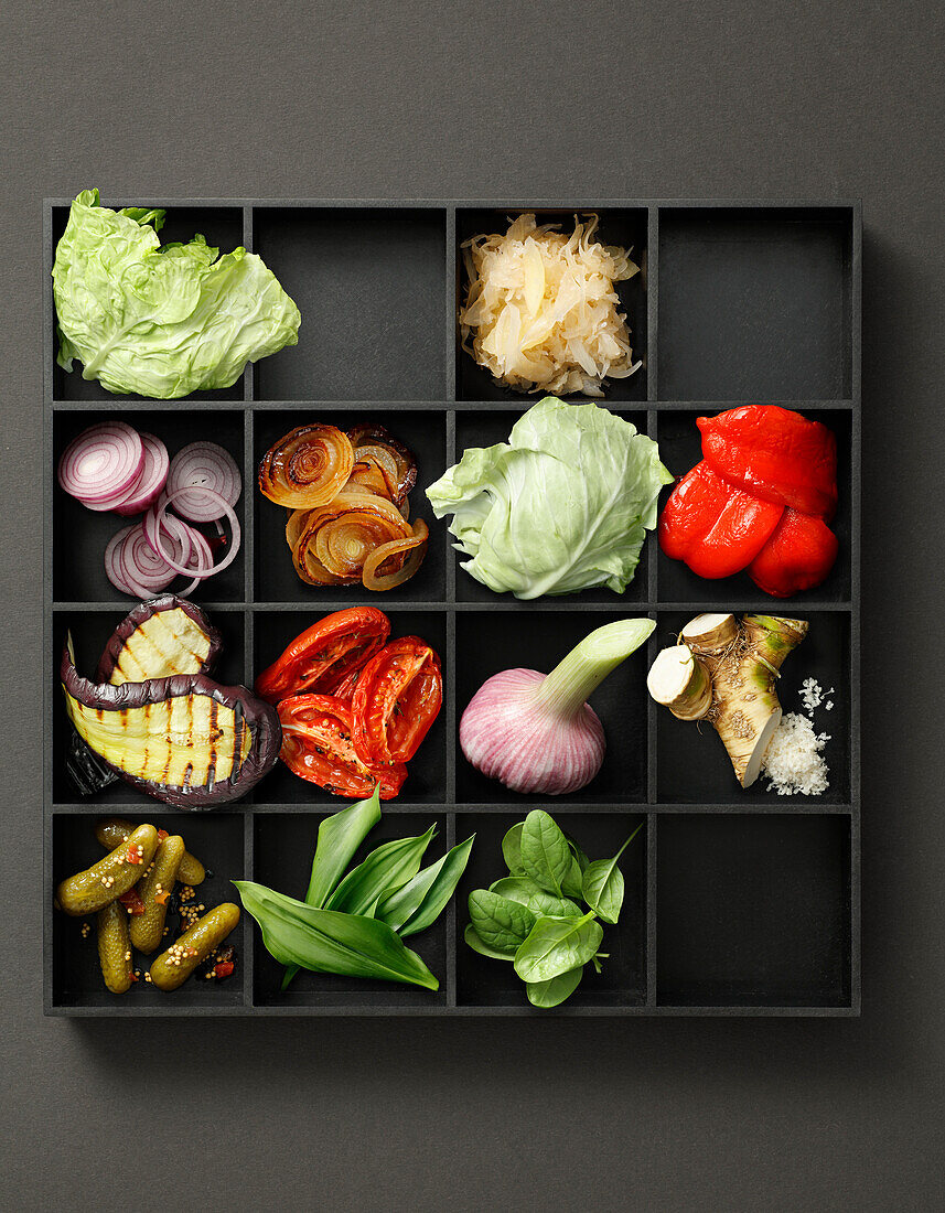 Tray with fresh and prepared vegetables