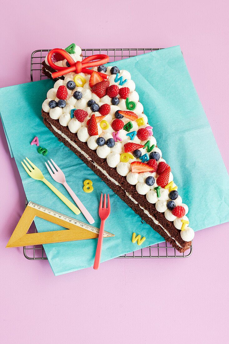 School cone cake with sweets