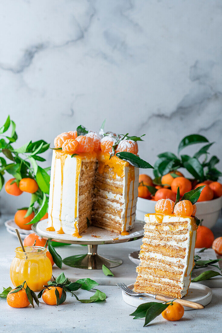 Clementine cake with sour cream, honey cake layers and clementine quark
